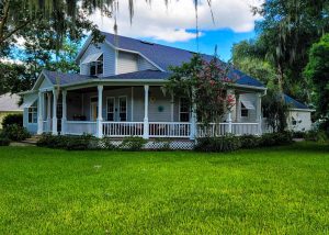 High-quality roofers working on a house with a new roof in Clermont, FL.