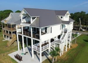 New residential roof installation on a multi-story house in Clermont, FL.