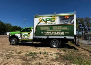 Gutter installation truck with APC Roofing logo in Clermont, Florida, ready for residential and comm.