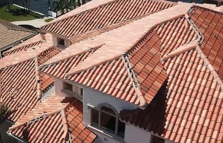 Roof with terracotta tiles in a residential neighborhood.