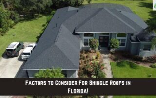 Aerial view of a residential shingle roof with lush landscaping and driveway.