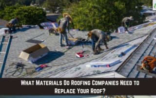 Roofers working on a residential roof installation with new shingles and safety gear.