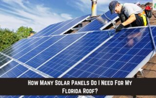Roofer installing solar panels on a residential roof with blue sky background.