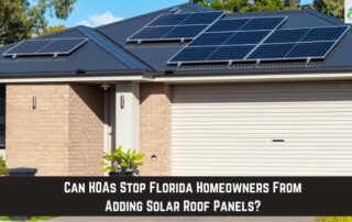 Solar roof panels installed on a modern house with a dark roof and solar energy system.