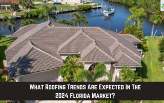 Roofers installing a new roof on a large residential property near water.