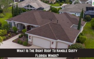 Roofers installing new asphalt shingle roof on residential home.
