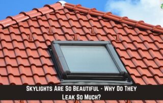 Skylight on red tiled roof with storm damage and leak concerns.