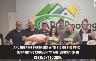 Roofers holding a pig donation at a community outreach event in Clermont, Florida.