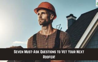 Roofing inspector wearing a hard hat overlooking a house roof.