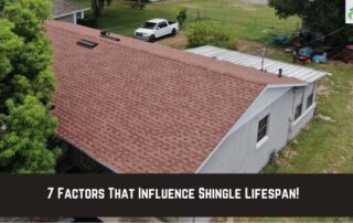 Roofers installing shingles on residential roof during daytime.