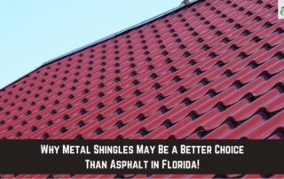 Close-up of red metal shingles on a residential roof with blue sky background.