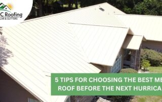 Metal roof installation on a residential house with a white standing seam roof.
