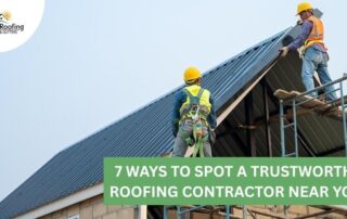 Roofers installing metal roofing panels on a residential home.