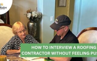 Roofers discussing roofing options with senior homeowner during an interview.