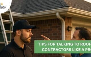 Roofer talking to homeowner about roofing project outside house.