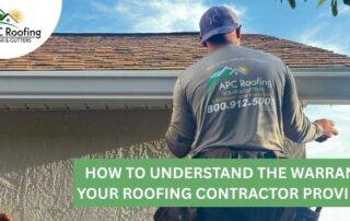 Roofer inspecting a residential roof for warranty and storm damage.