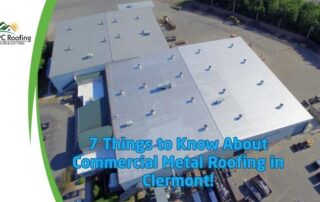 Aerial view of a commercial metal roofing project in Clermont with multiple white roof sections.