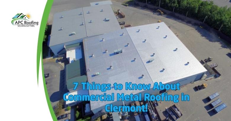 Aerial view of a commercial metal roofing project in Clermont with multiple white roof sections.